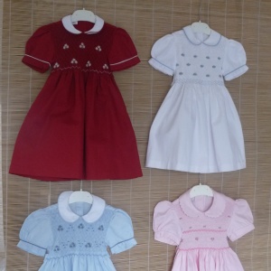Smocked dresses with puff sleeves and claudine collar